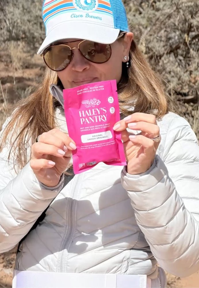 Customer holding a Haley's Pantry Original snack pack outdoors
